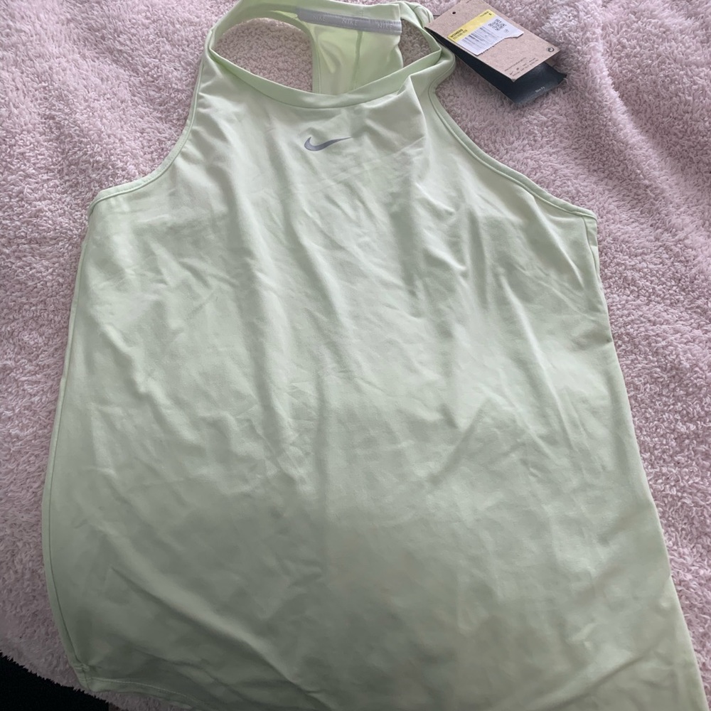 Light green Womens Nike  tank top.
